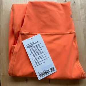 Lululemon Wunder Train 25” size 6 in color Orange Soda